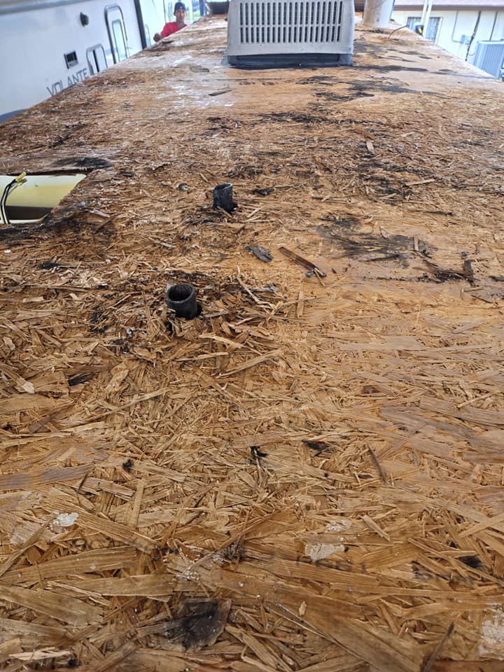 Rotted RV roof decking before repair