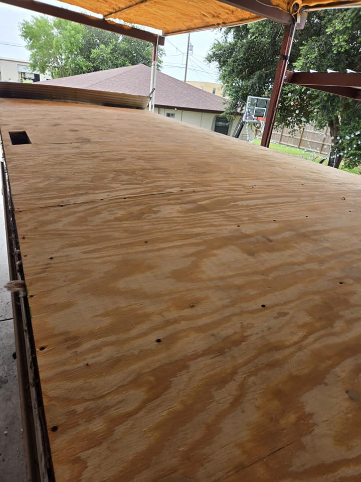 New plywood roof decking installed